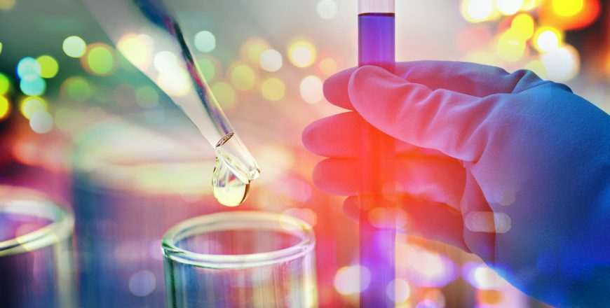 Double exposure of scientist hand holding laboratory test tube