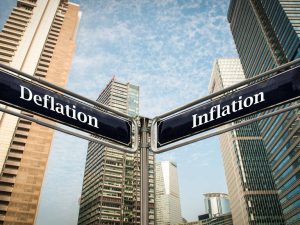 Street Sign the Direction Way to Inflation versus Deflation